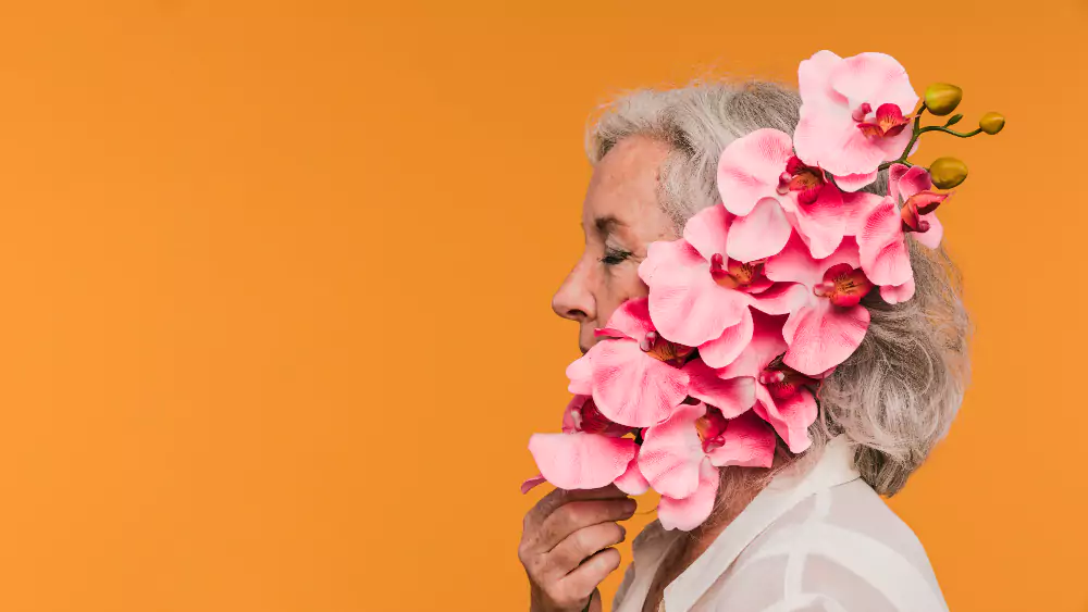 Elderly Woman With Flower