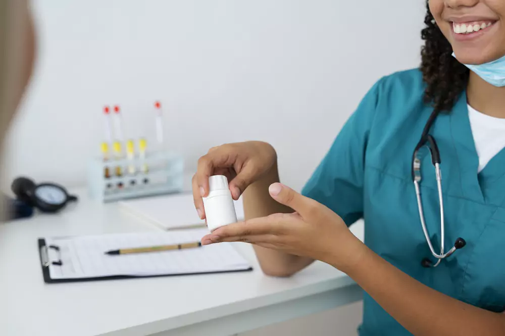 Female Nurse Practicing Medicine Clinic